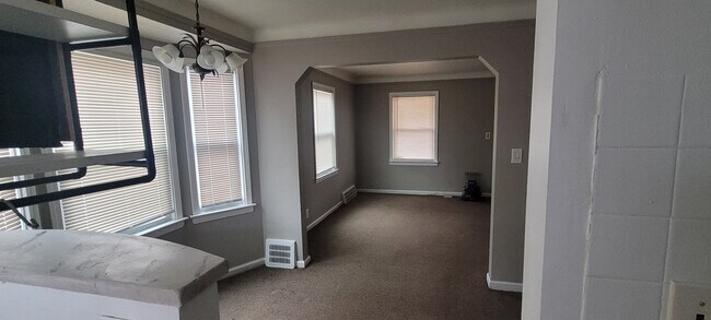 open concept living room dining area - 19928 Ashton Ave