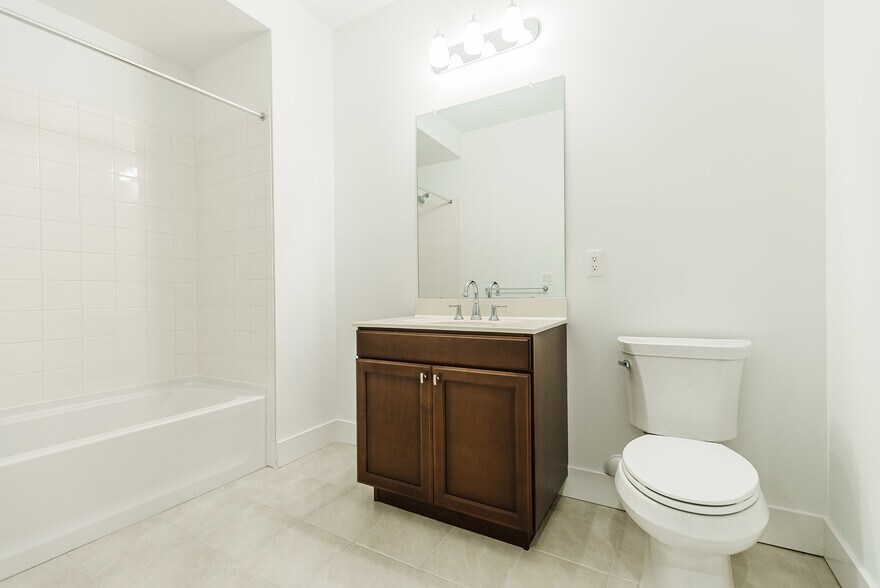 Level 1 Full Bath + Powder Room - 7104 Donatello Dr