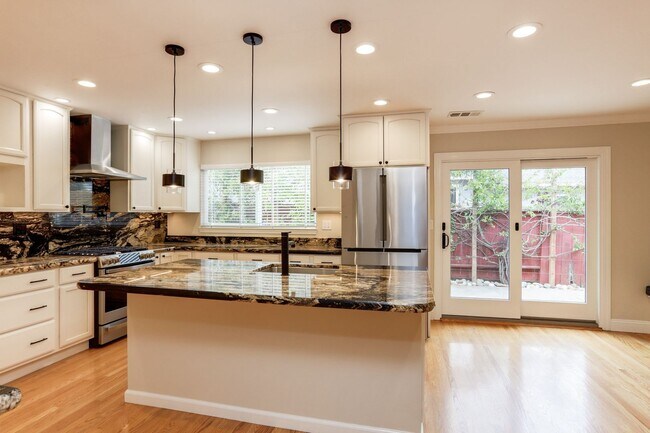 Building Photo - 4BR/3.5BA Belmont Home with Multiple Ensuite Bedrooms, A/C & 2-Car Garage | YouTube Tour