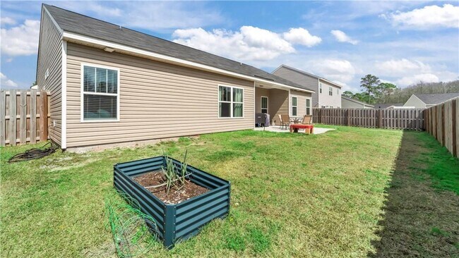 Building Photo - Relax & Unwind at this 4-Bedroom Home with Scenic Lagoon Views in Rincon