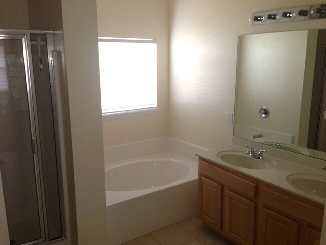 Building Photo - 3/2 House in the Gated Spring Lake Village Community with Water View