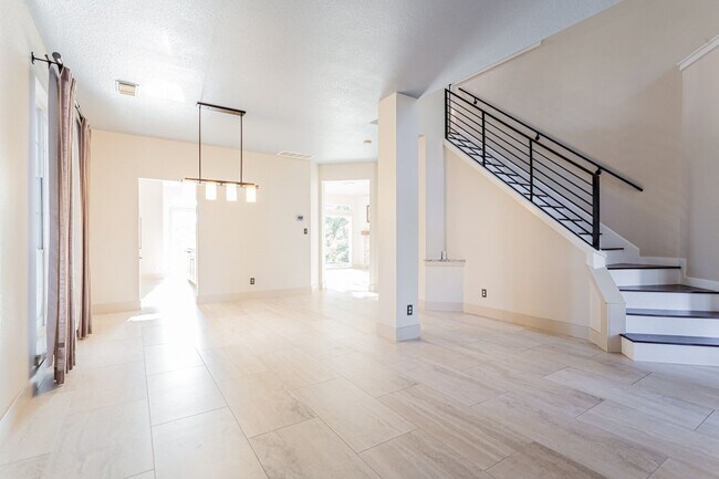 Building Photo - Gorgeous 4BR 2.5/BA Home with White Kitchen & Tree-Filled Yard