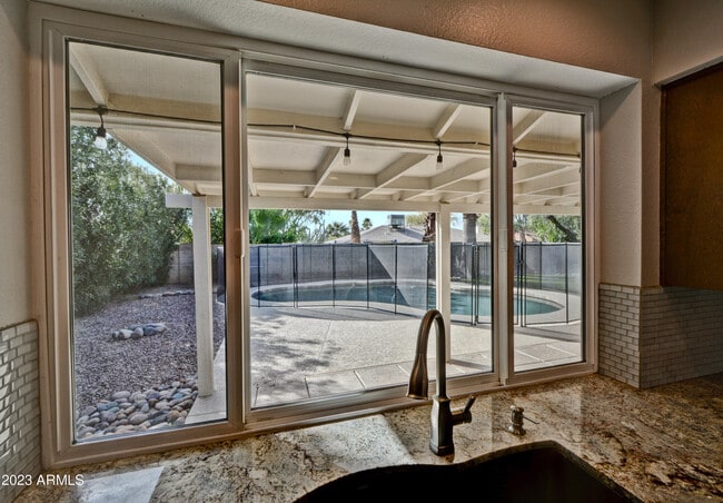 Building Photo - 6747 E Aire Libre Ln