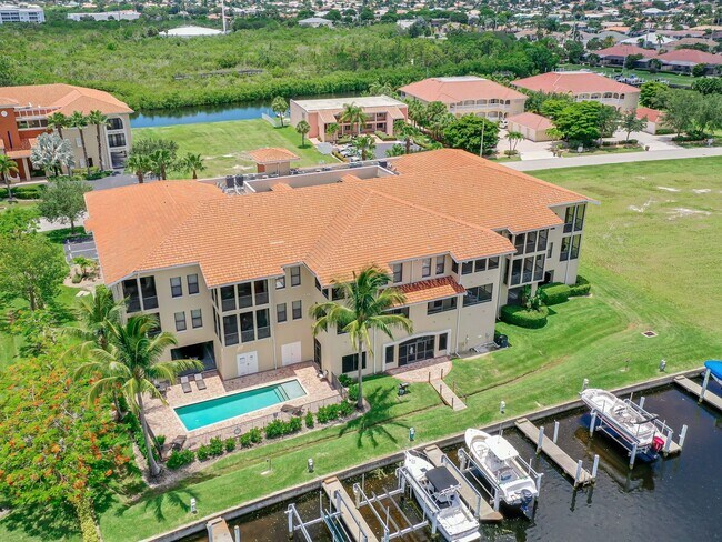 Building Photo - BEAUTIFUL 3-BEDROOM  WATERFRONT CONDO WITH BOAT SLIP AND HEATED POOL