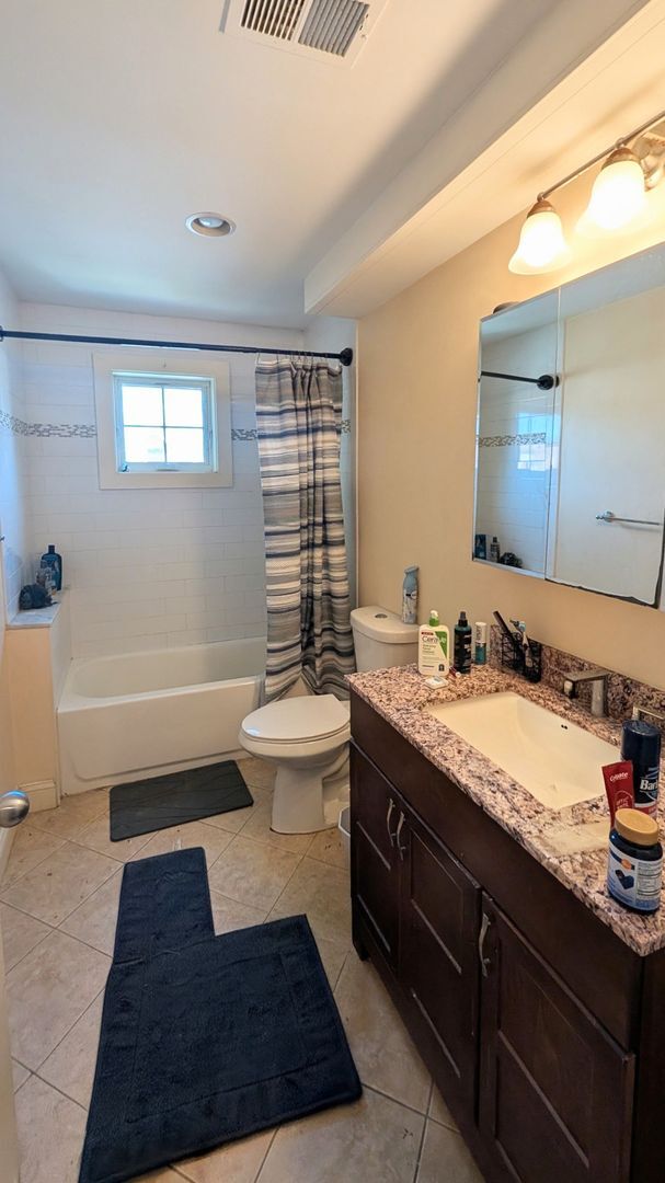 Building Photo - Spacious Townhouse: 4-bed, 3.5 bath unit in Brighton with Garage Parking
