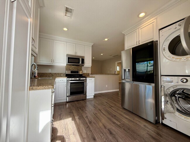 Building Photo - Cottage Home in Normal Heights! Conveniently offers A/C, in Unit Washer/Dryer, Assigned Parking P...
