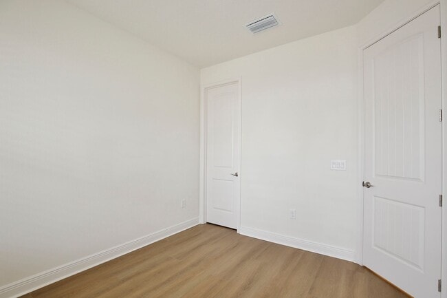 Building Photo - Gorgeous 4/3 Residence with a Private Back Lanai and a 2 Car Garage in the Delightful Laureate Pa...