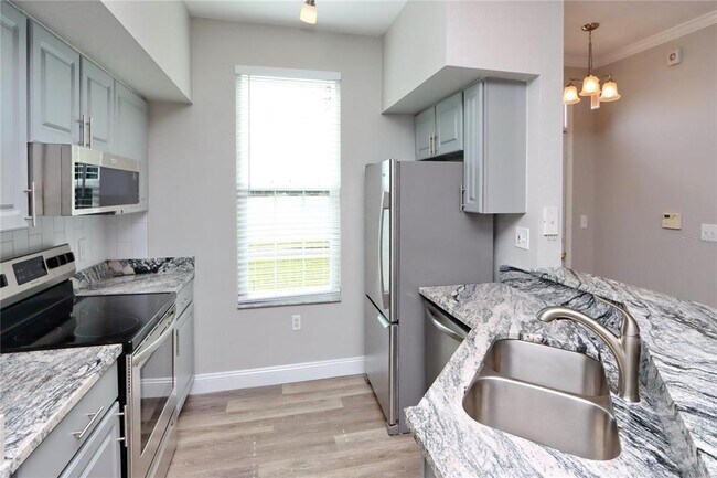 Building Photo - 9088 Lake Chase Island Way