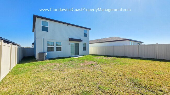 Building Photo - BRILLIANT and SPACIOUS! 4 BEDROOM/2.5 BATH PLUS LARGE BONUS-FLEX SPACE and FENCED YARD!