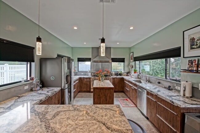 Building Photo - Beautifully Remodeled, Bright & Modern 4BR3BA Home w/ 2BR1BA Guest House On Sprawling Corner Lot ...
