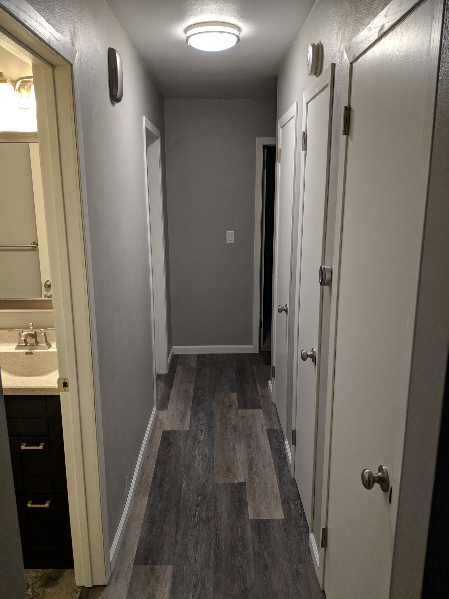 Hallway with plenty of storage space and Nest thermostat - 705 E. 19th Street