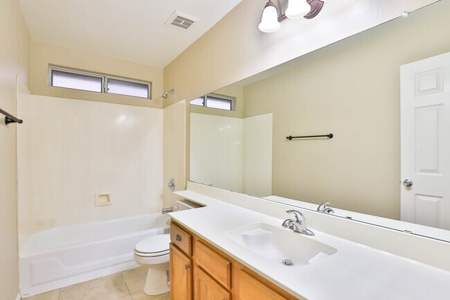 Building Photo - 8438 W Charter Oak Rd