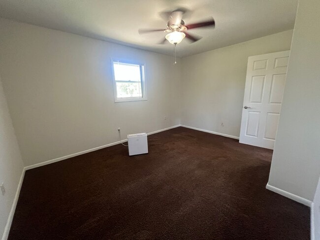 Building Photo - Charming 4-Bedroom Brick Home on Spacious ...