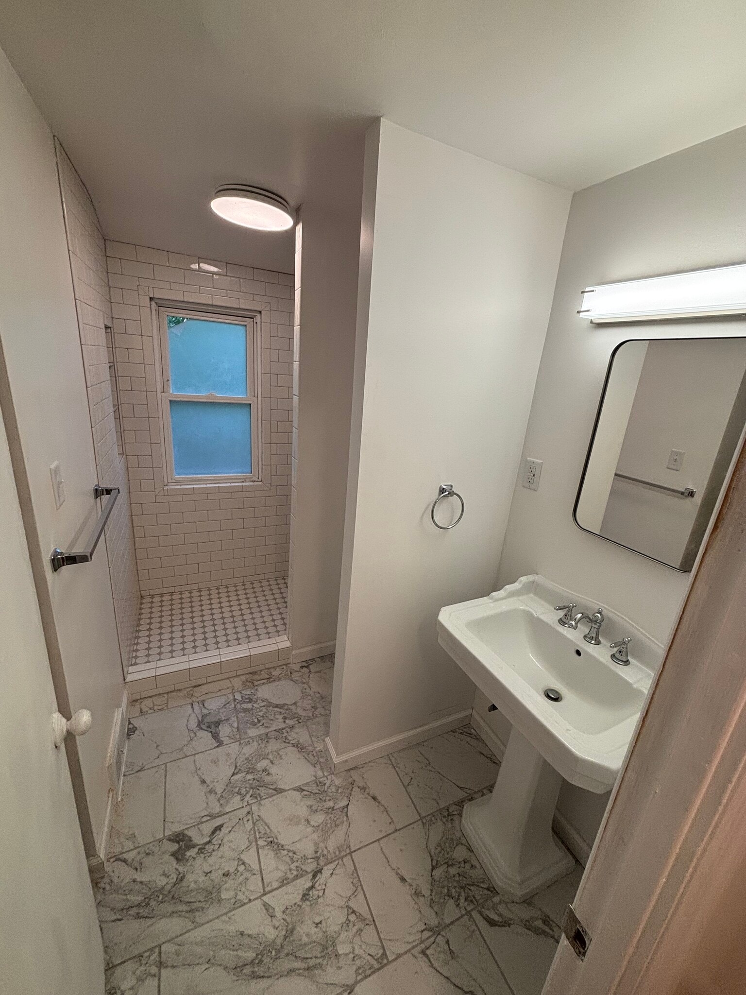 Step-in shower. New tile throughout! - 917 S Division St