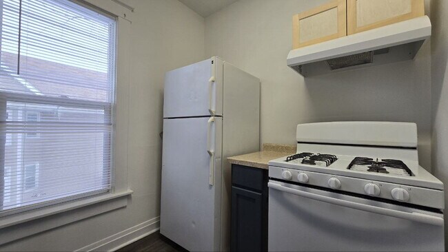 Building Photo - Spacious 3BR/1BA First-Floor Home with Garage & Fenced Yard in Quiet Michigan City Neighborhood