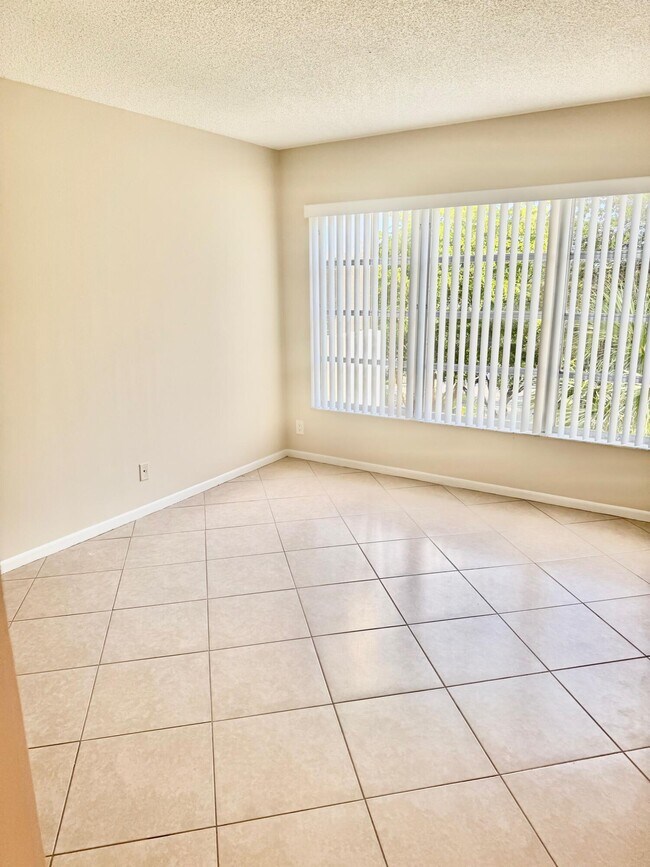 Building Photo - 10777 W Sample Rd