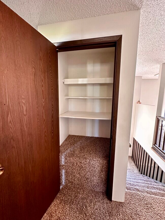 Upstairs linen closest 1 - 13409 E 8th Ave