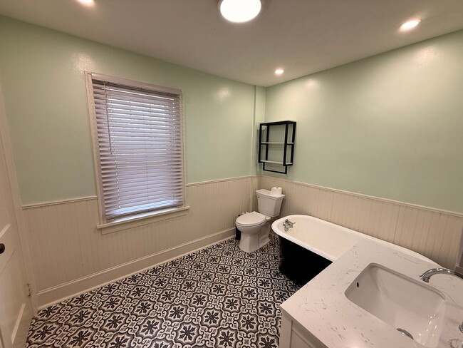 Building Photo - 3 Bedroom 2 1/2 Bathroom with one car detached garage