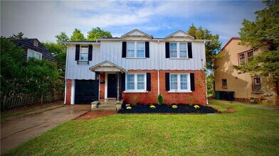 Building Photo - This is where timeless style meets today's conveniences.