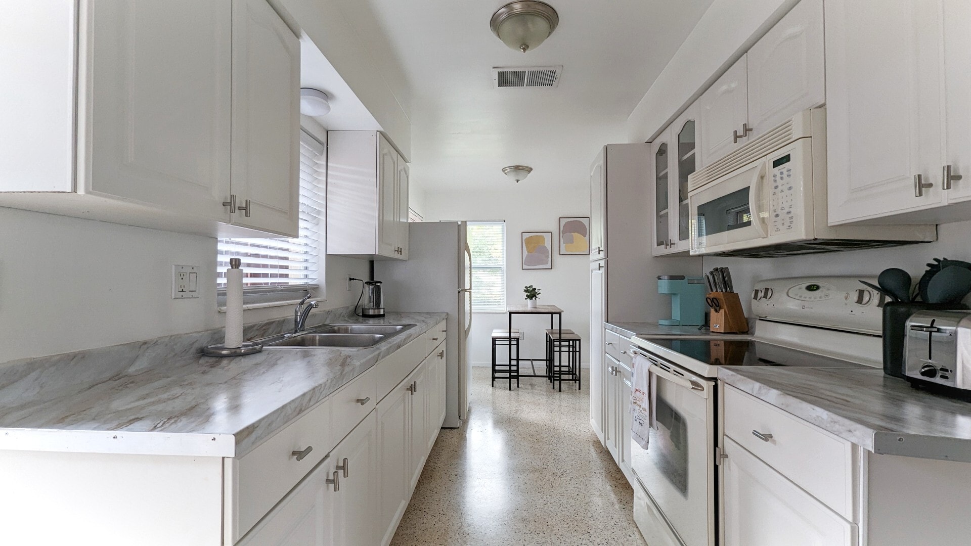Kitchen will all the amenities you'd need including a Keurig - 2846 W Tamiami Cir