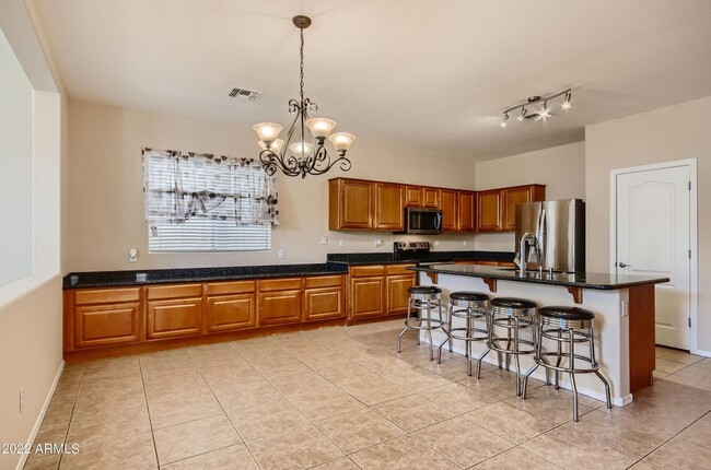 Building Photo - Beautiful 4-Bed, 3-Bath Home with Granite Kitchen, Stainless Steel Appliances, Vaulted Ceilings, ...