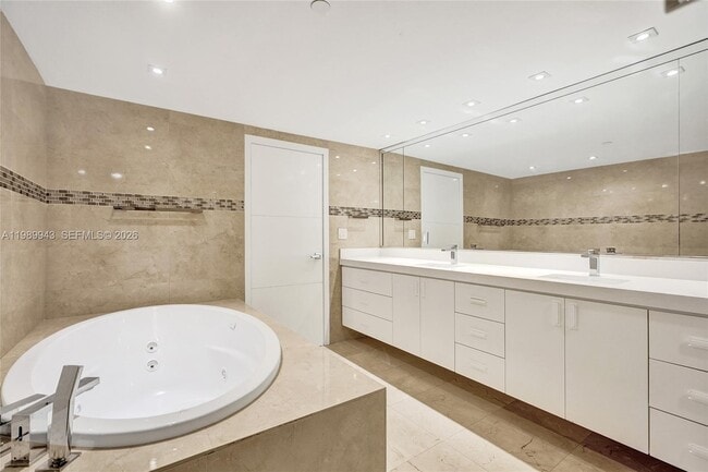 Building Photo - 10175 Collins Ave