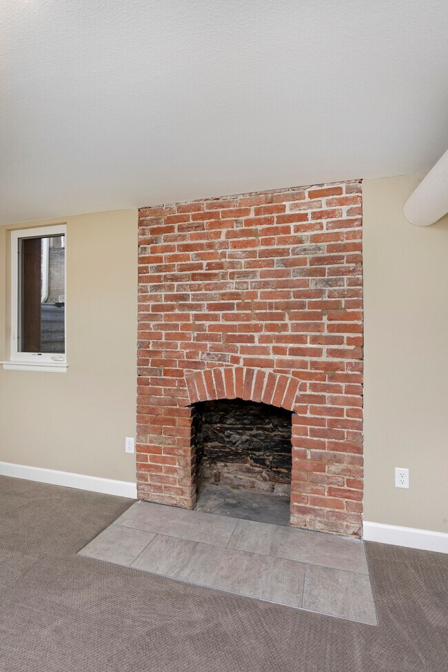 fireplace is now painted white - 915 Clarkson Street