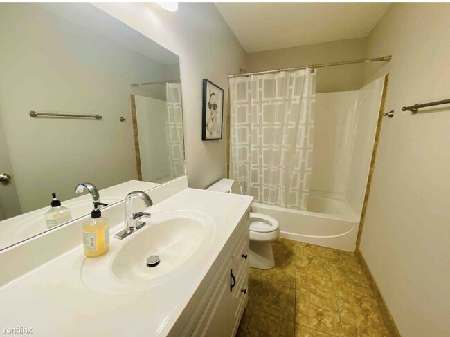 Building Photo - Room for Rent, 3 bath Duplex - 85 W 8th Av...