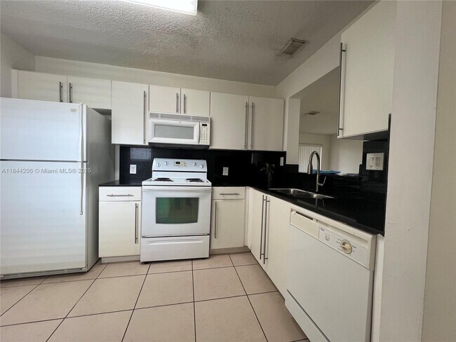 Building Photo - 18051 NW 68th Ave