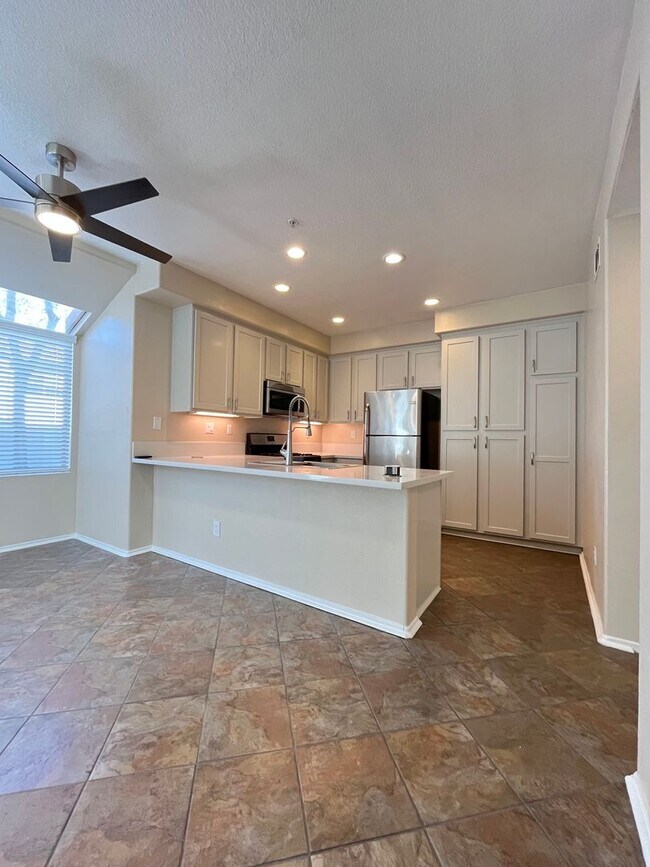 Building Photo - PICTURE PERFECT!  3 BR/3 BA END UNIT CONDO with DIRECT ACCESS 2 CAR GARAGE