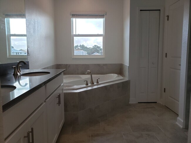 Building Photo - Bridgewalk Corner Lot Home with Wooded View and Solar Panels