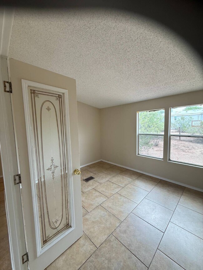 Building Photo - 6575 N Pelto Path