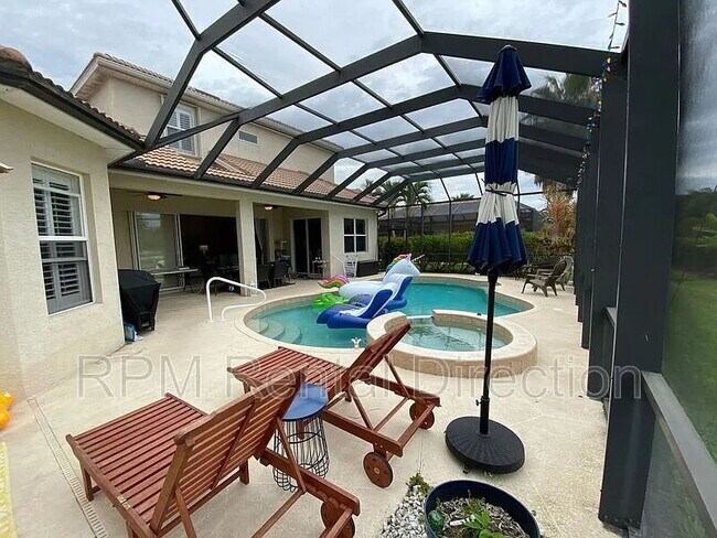 Building Photo - 4-Bedroom W/Den Lakefront Pool Home with Spa in Gated Promenade East at The Forum