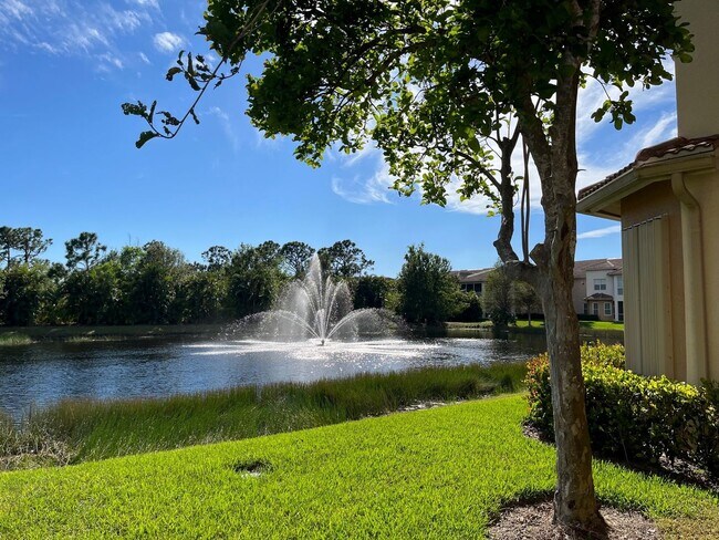 Building Photo - Meadows of Estero 1st floor unit with 2 car garage