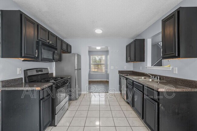Building Photo - 7227 Teakwood Pl