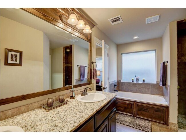 Building Photo - 4 Bedrooms/3Car/Storm Shelter-In Edmond Schools-Community Pool