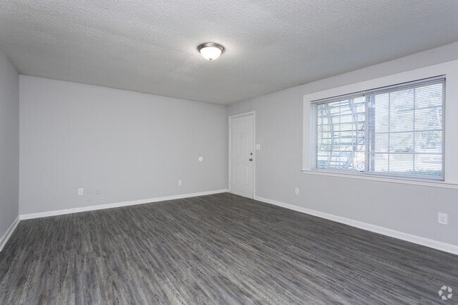 1BR, 1BA - 1,040SF - Living Room - Water Oak Village