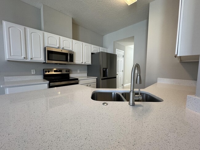 Building Photo - 12965 Langstaff Dr