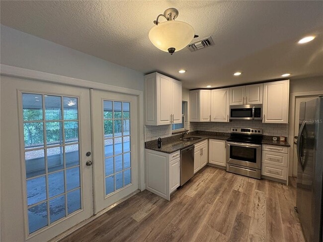 Building Photo - 5825 Lullaby Ln