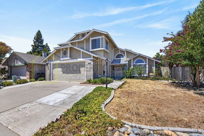 Building Photo - Spacious 4-Bedroom Retreat with 2.5 Baths