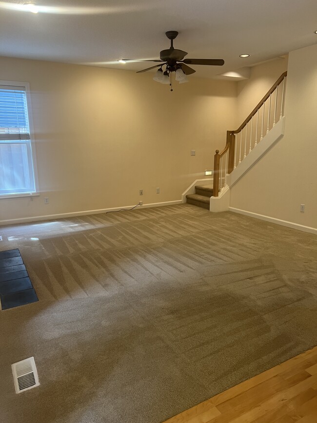 Living room off of kitchen and breakfast nook - 3921 NW Banff Dr