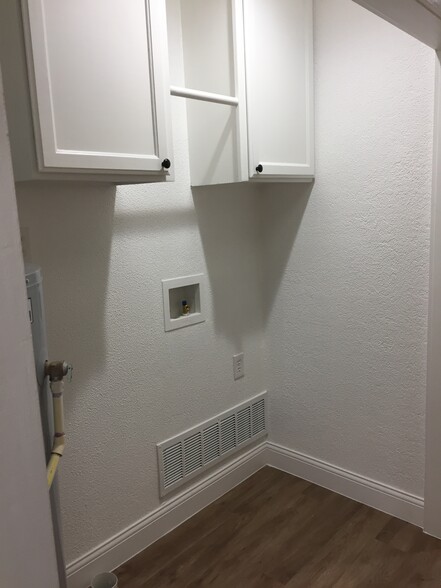 Laundry (in hall near back bedrooms) - 310 East 3rd St.