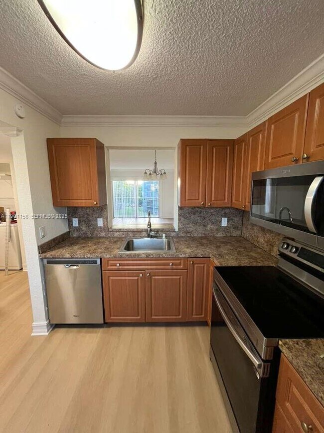 Building Photo - 8740 N Sherman Cir