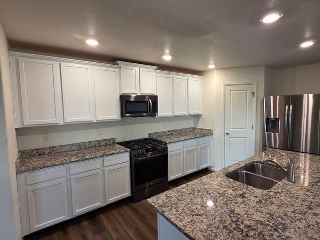 Building Photo - MASSIVE 5 Bedroom Home In Bennett!