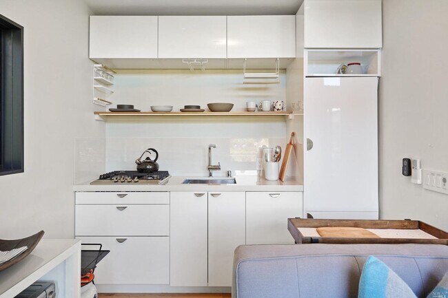 Building Photo - STUNNING STAND ALONE ADU STUDIO UNIT WITH TOP OF THE LINE FINISHES AND GREAT OUTDOOR SPACE