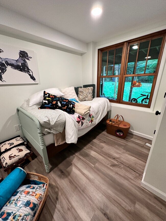 Building Photo - Dream Home in Highland, Michigan: Your Private Oasis on 5 Wooded Acres