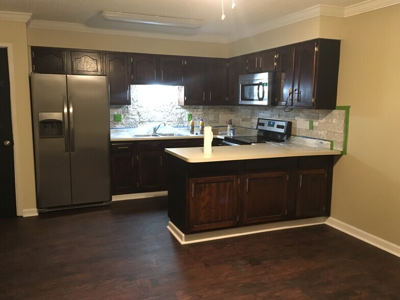 Gorgeous java stained kitchen with full size fridge and all stainless appliances - 1000 Ranchero Road