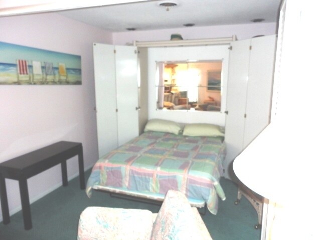 Building Photo - 1BR + Den with Murphy Bed/2BA Single level villa on the Beach!