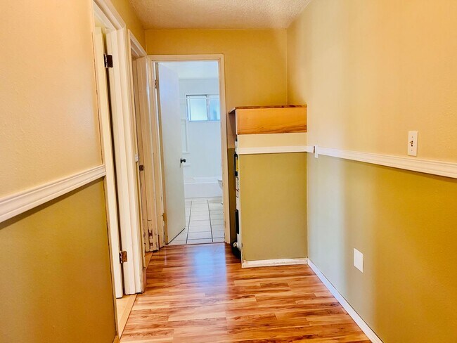 Building Photo - Charming 3BR/1BA w/ 1-car garage, long driveway, fenced yard, wood stove & shed/workshop.