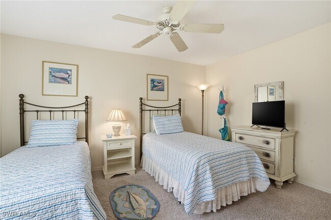 Building Photo - 7048 Pelican Bay Blvd